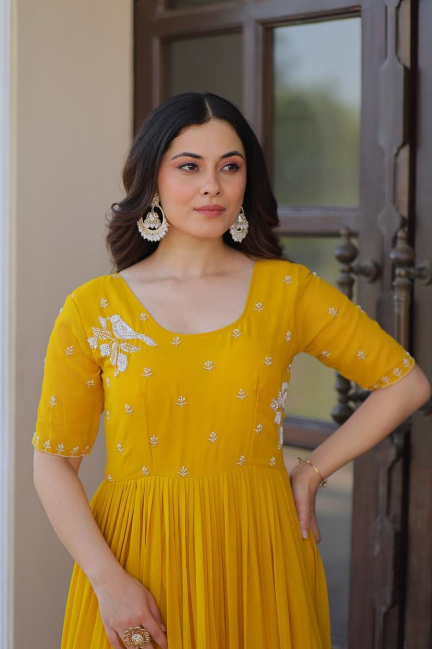 Elegant Yellow Embroidered Tiered Anarkali Gown with Flowy Flared Design